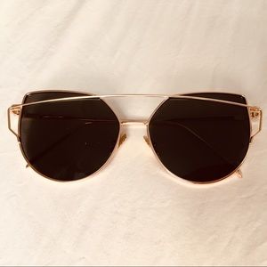 Gold frame sunglasses